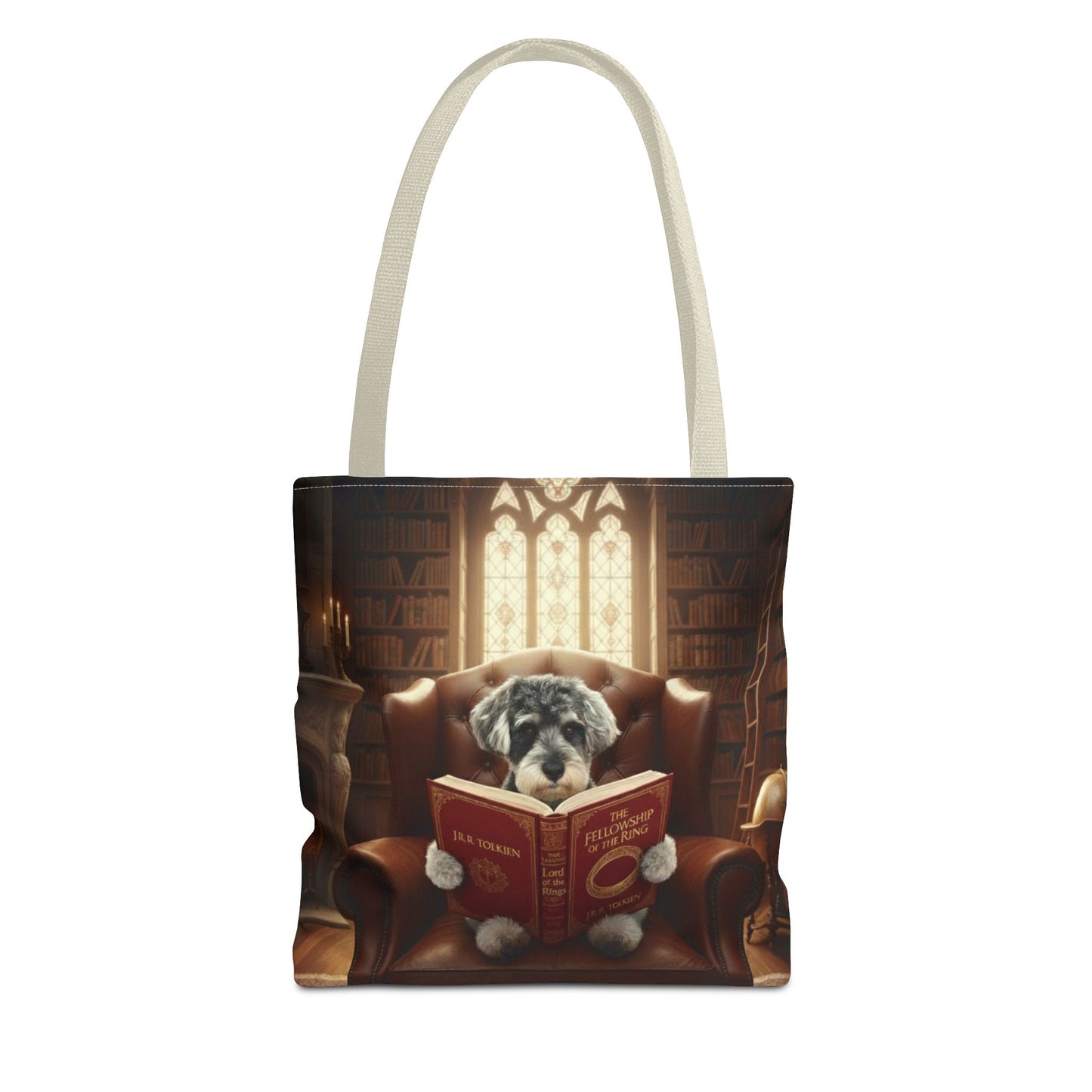 All-over print tote bag with beige handle, shown in 13"x13". Featuring an example bespoke scene of a dog reading a book, in an old library. We design unique art for you and your non-human family.
