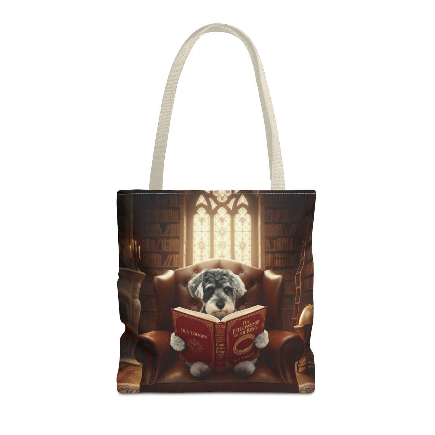 All-over print tote bag with beige handle, shown in 16"x16". Featuring an example bespoke scene of a dog reading a book, in an old library. We design unique art for you and your non-human family.