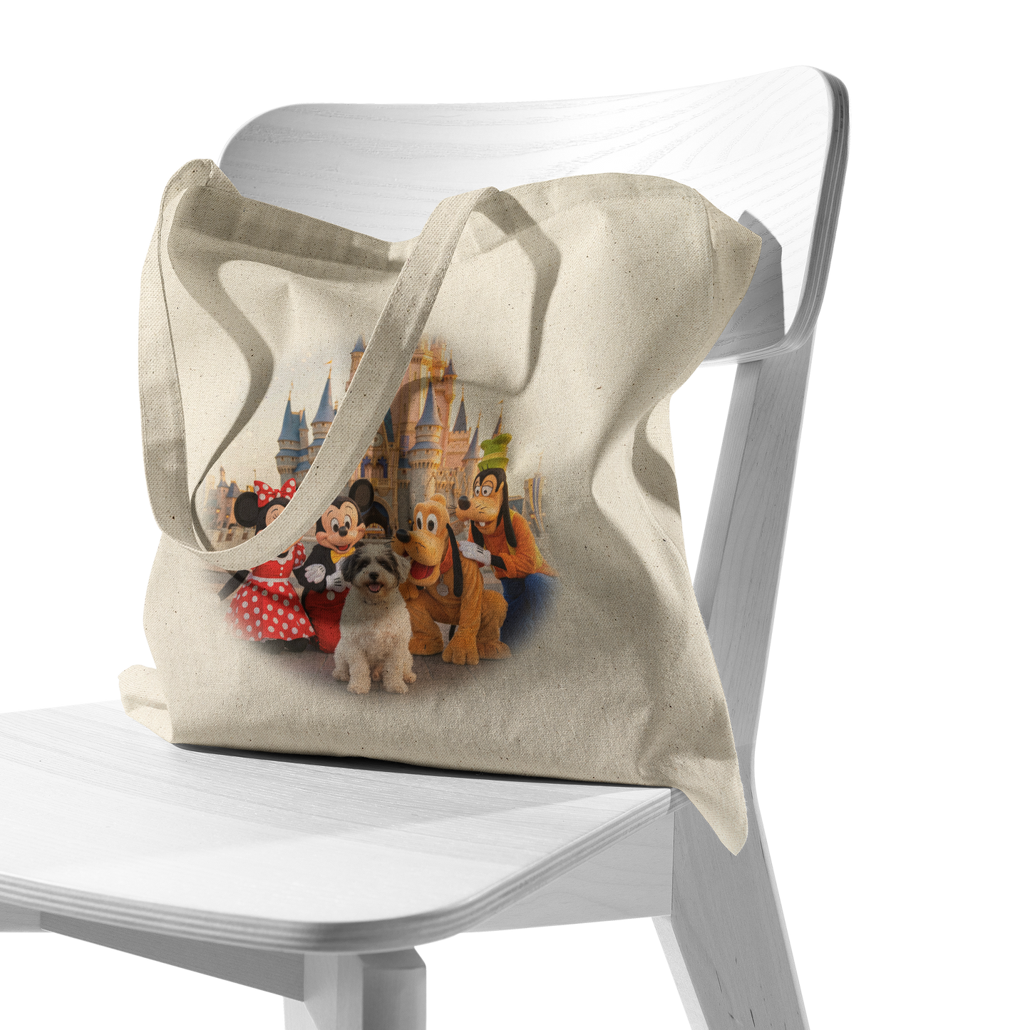 Bespoke pet art canvas tote bag displayed on a white chair. Every design is an example of how we bring your unique family memories to life on functional, high-quality products.