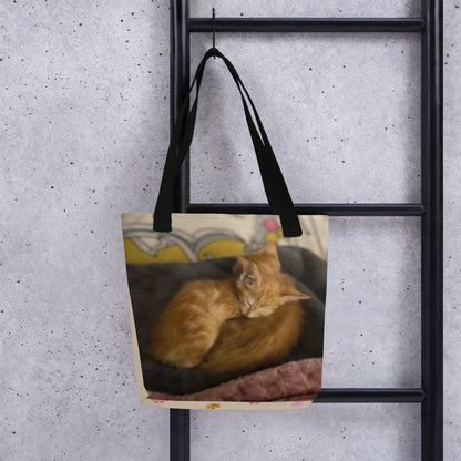 Custom pet art tote bag hanging on a ladder to show scale and style. A unique, bespoke accessory designed to bring your favorite pet memories to life.