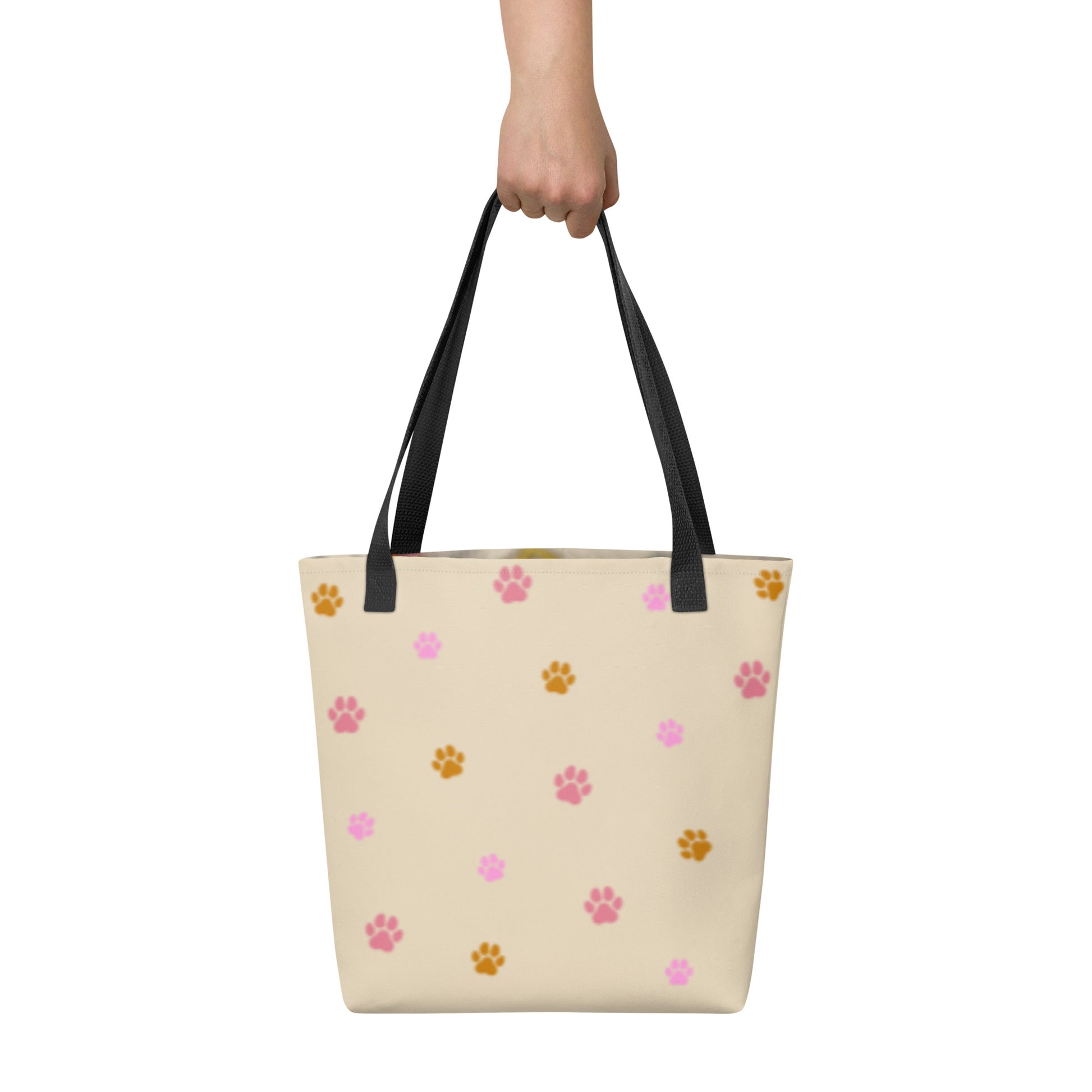 Rear view of the custom all-over print tote bag showing a pattern of paw prints. Every design is a bespoke example created to honor the unique bond with your non-human family.